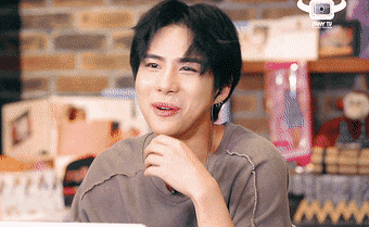 Sehyoon talking with a smile
